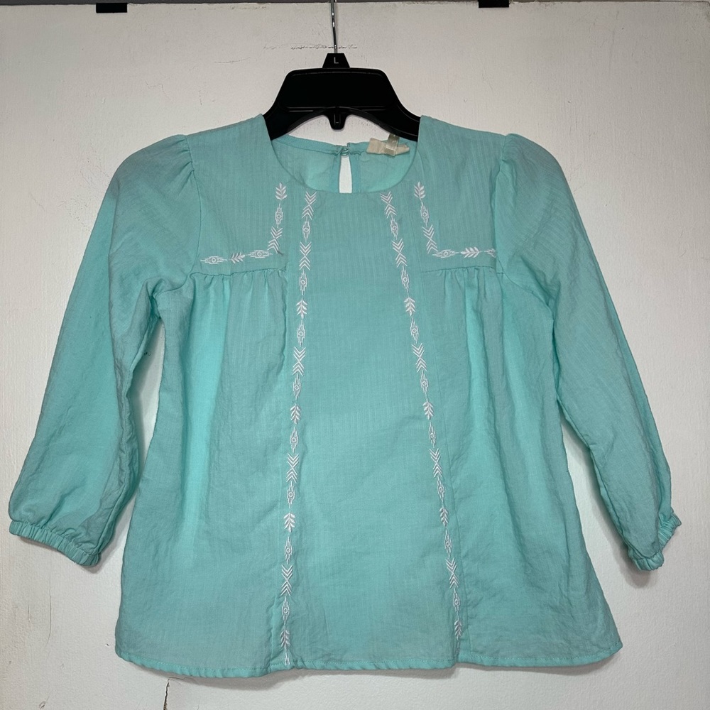 Girls light blue top